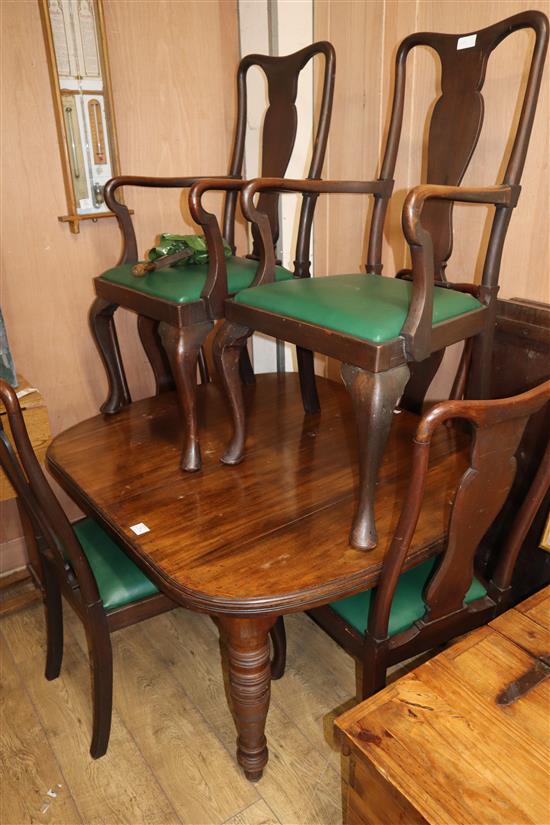 A Victorian mahogany extending dining table and six George III style dining chairs W.122cm unextended
